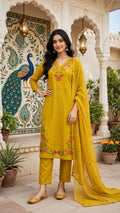 Front view of mustard yellow floral embroidered kurta set with trousers and dupatta