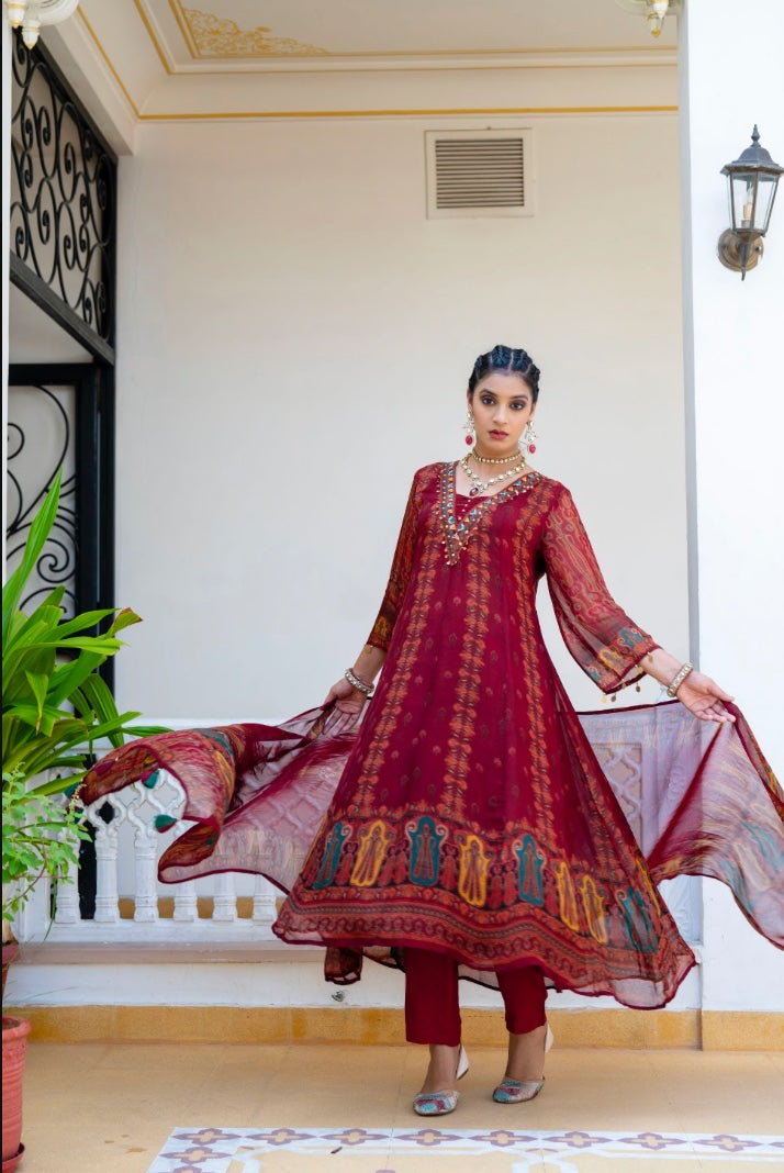 Full view of maroon festive kurta set with flowing dupatta