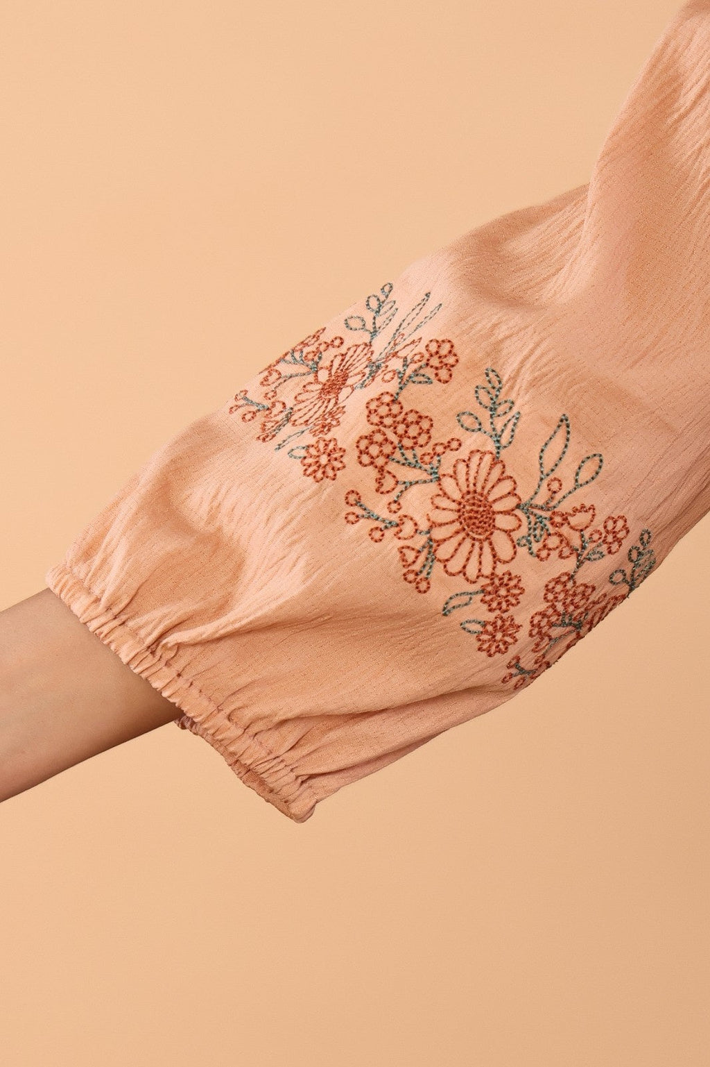 Women Peach Floral Embroidered Cotton Peplum Top