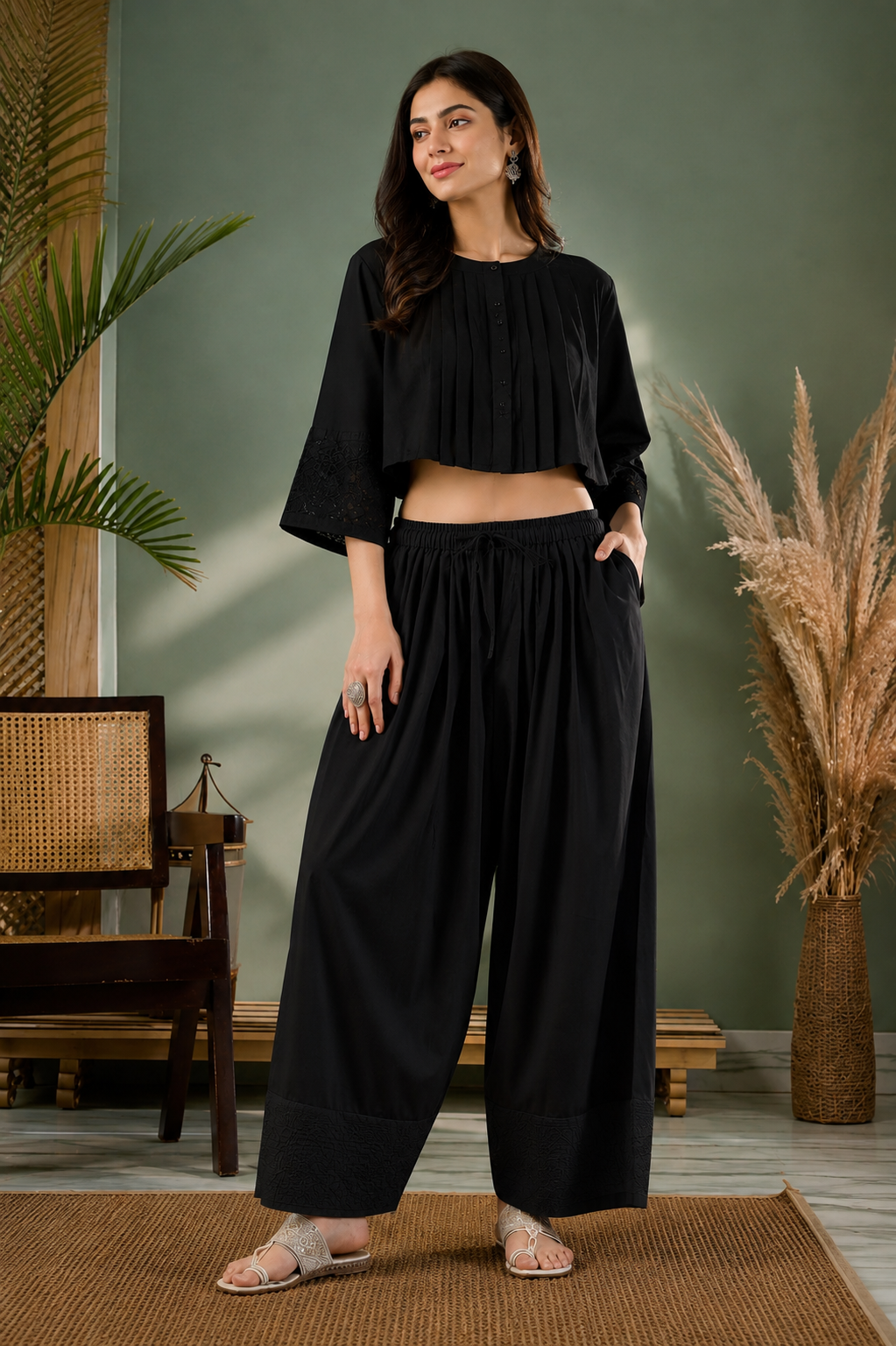 Black farshi salwar side view showing wide flare and pocket