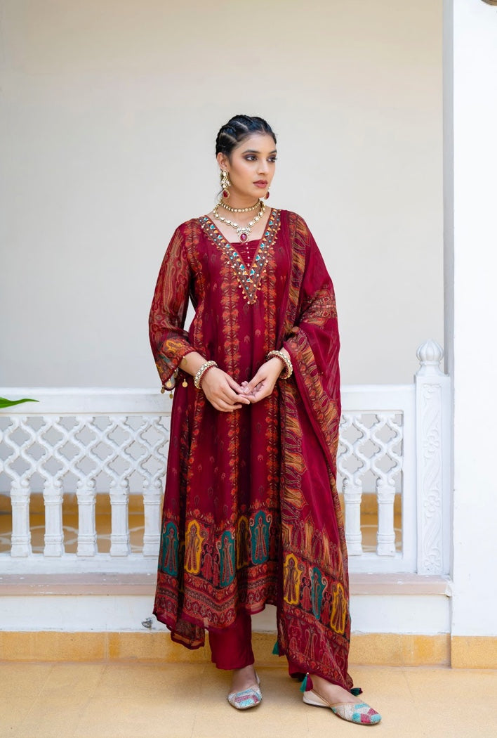 Woman wearing a maroon printed ethnic kurta set with trousers