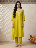 Front view of lime green embellished kurta set with trousers and dupatta